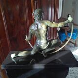 bronze sculpture athlete bending an iron bar by Jean de Roncourt on an art deco marble base