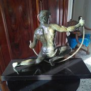 bronze sculpture athlete bending an iron bar by Jean de Roncourt on an art deco marble base