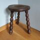 Tripod stool in wood turned coil way