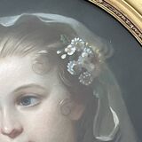 Portrait of a young girl in pastel from the 19th century.