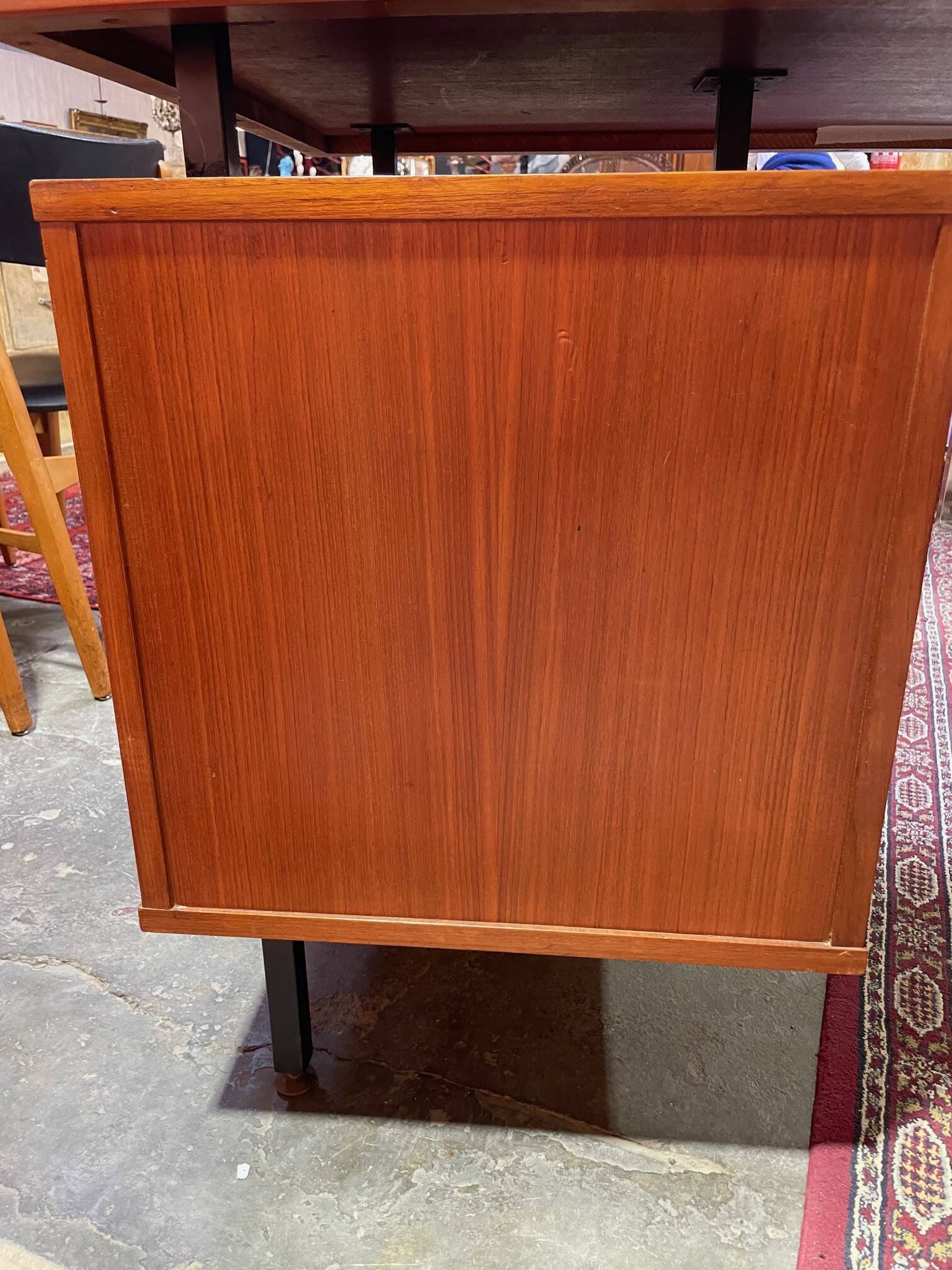 Vintage teak desk by Jacques Hitier from the 1960s.