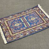 Small handmade wool Iranian rug.