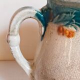 Antique dragonfly slip pitcher