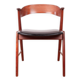 Danish armchair in teak and Skai, by Henning Kjaernulf for Korup Stolefabr.