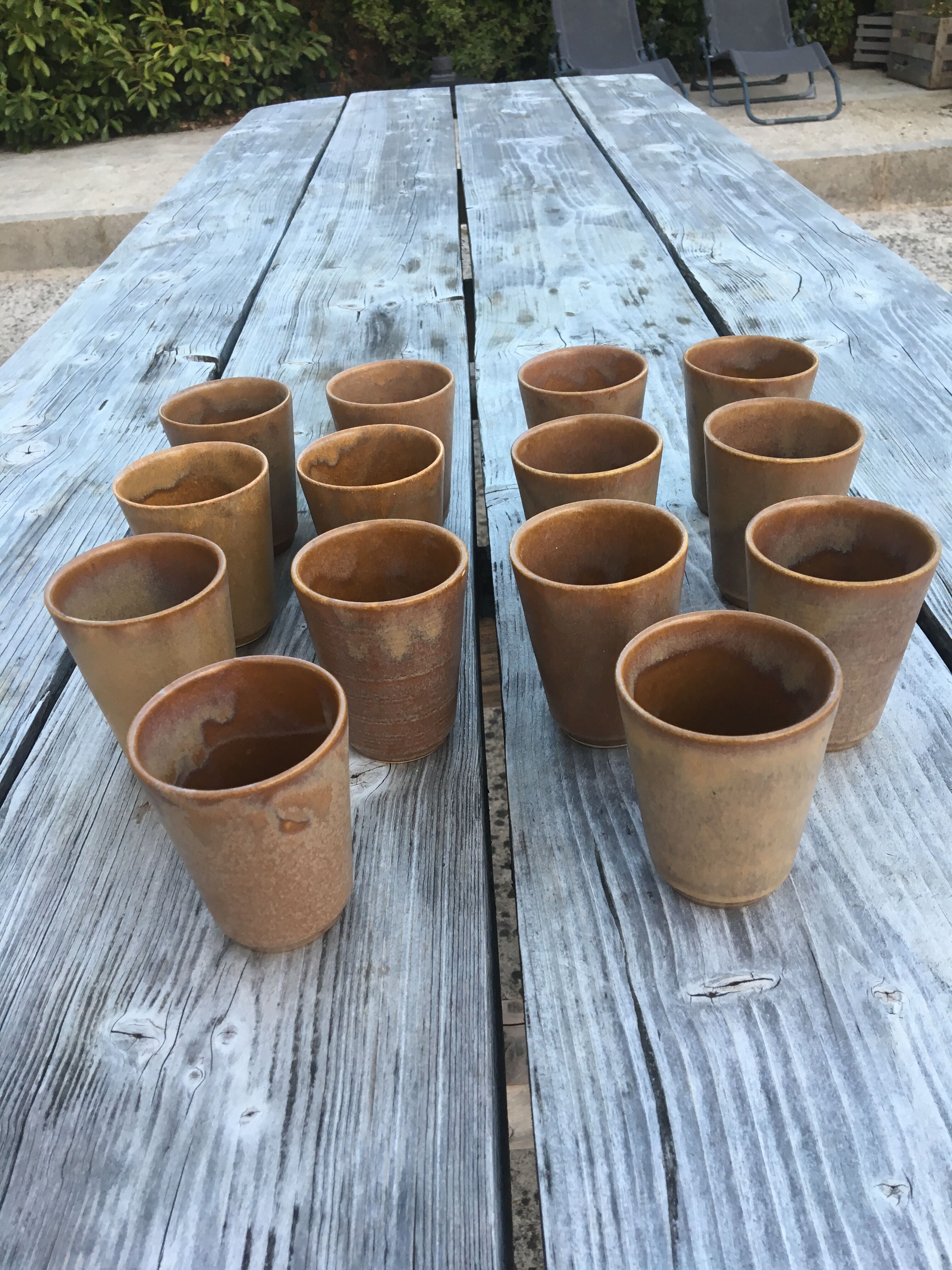 Set of 14 sandstone cups