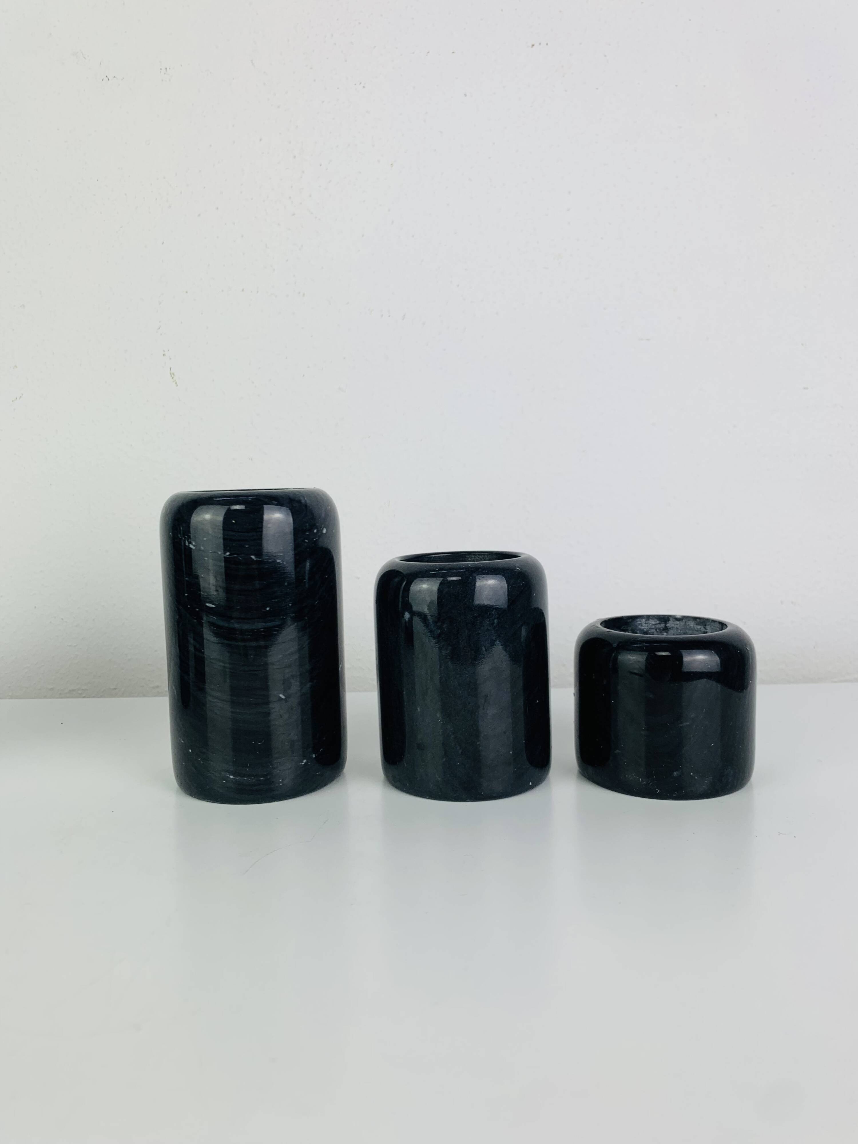 Vintage black marble candlestick trio