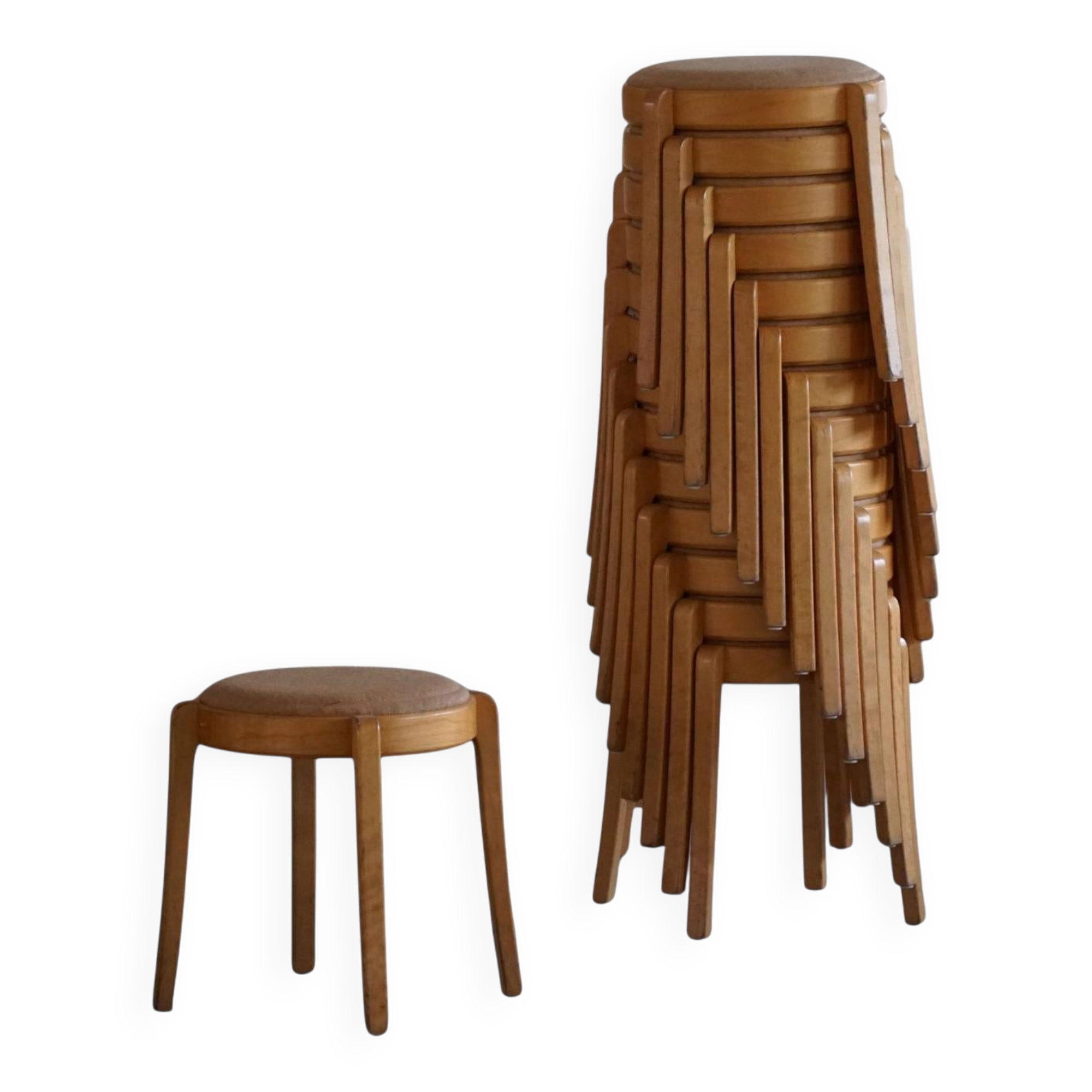 Set of 14 modern Swedish stackable stools in birch and hessian, 1980s.