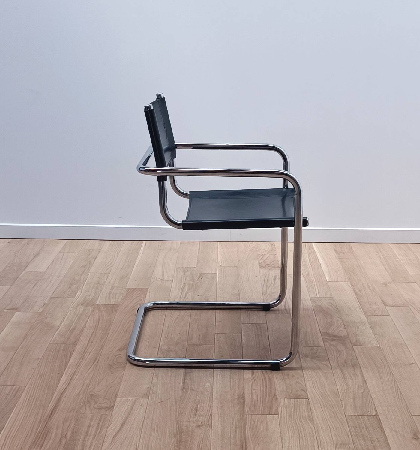 Suite of 12 designer armchairs