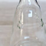 Vintage glass carafe with embossed bee motifs