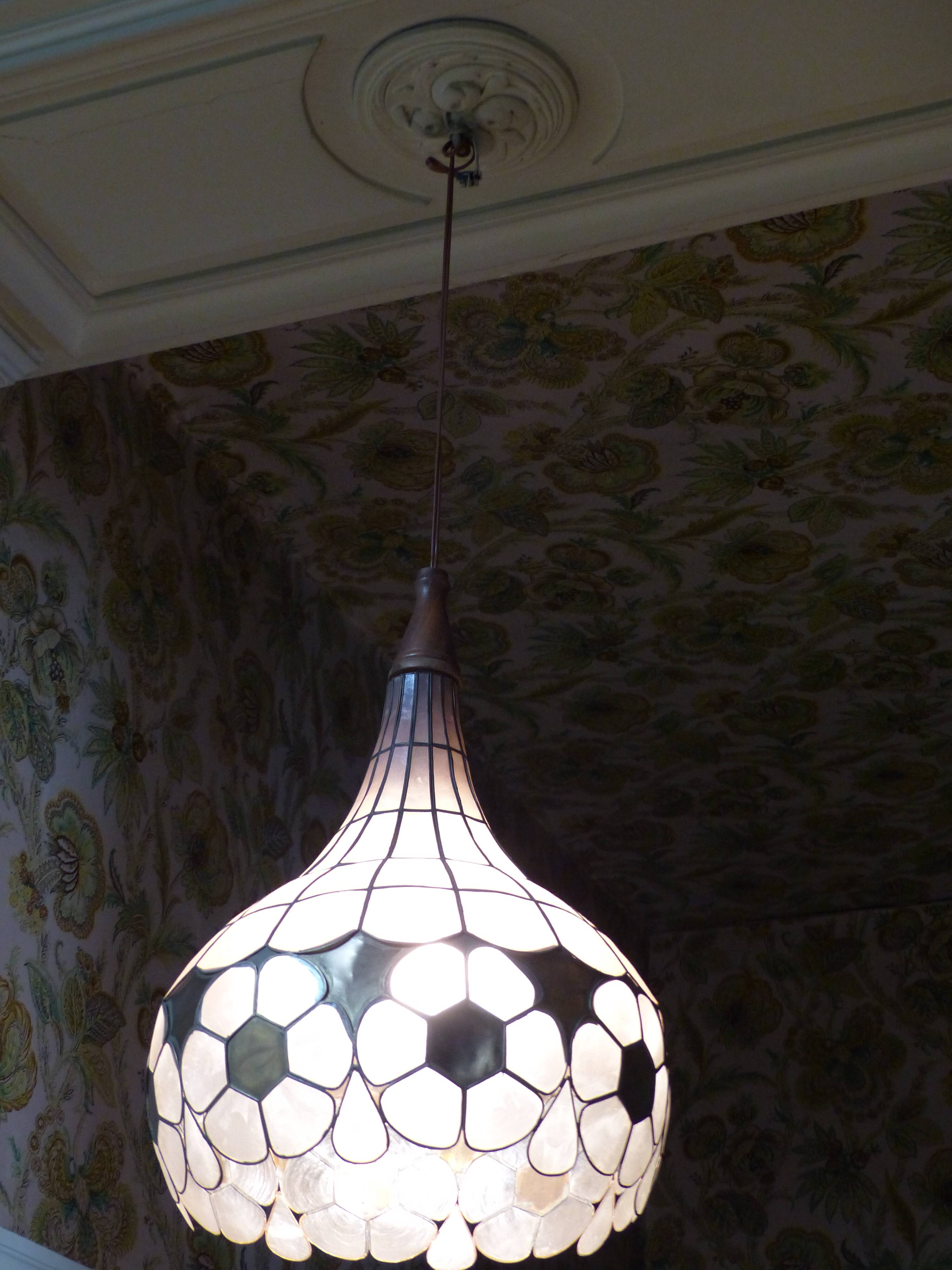 Colorful mother-of-pearl chandelier and brass