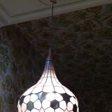 Colorful mother-of-pearl chandelier and brass
