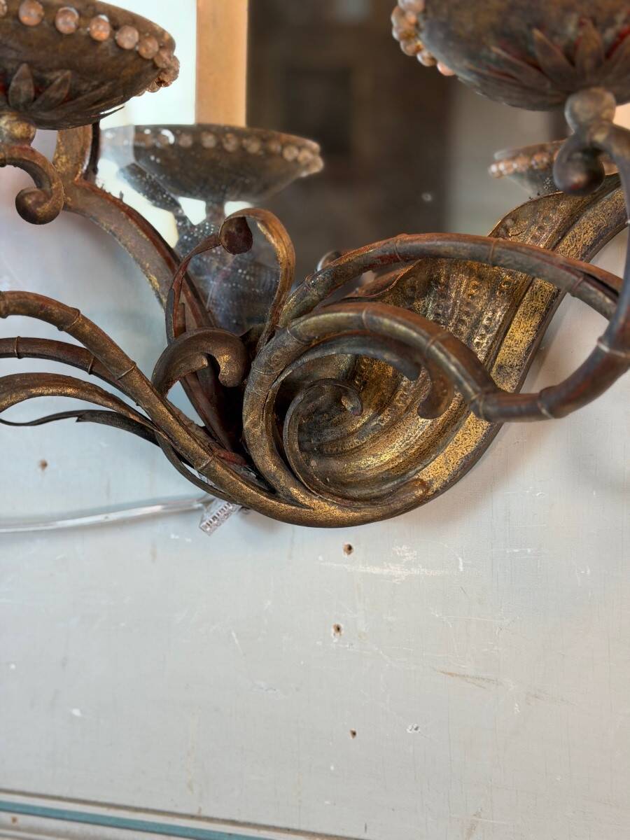 Gold metal wall mirror, in the style of Maison Baguès, Paris circa 1950.