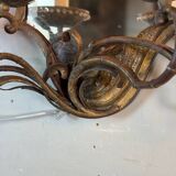 Gold metal wall mirror, in the style of Maison Baguès, Paris circa 1950.