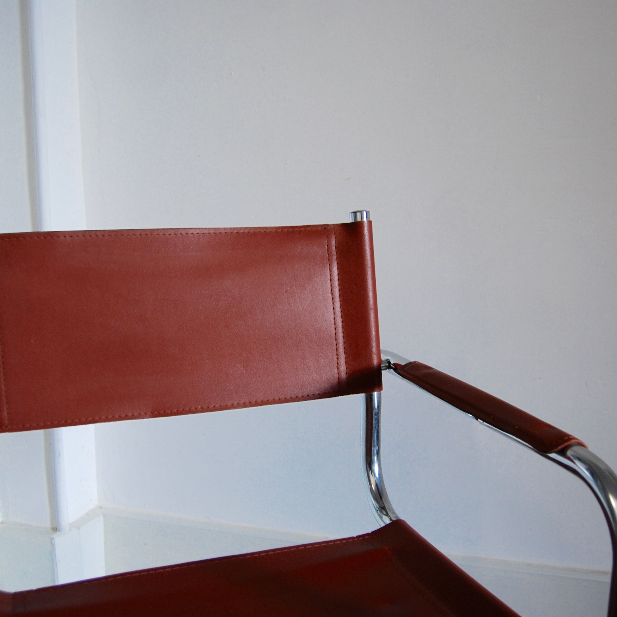 Vintage armchair in chrome and cognac leatherette