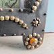 Antique wooden studded mirror