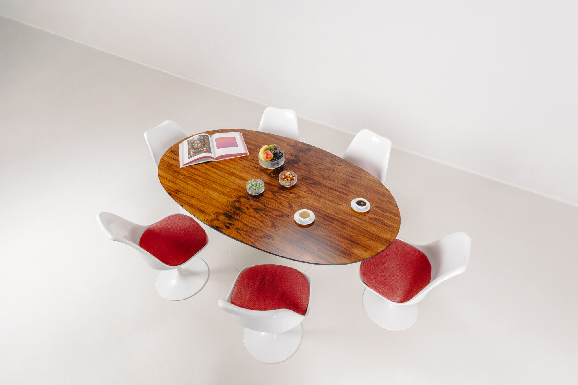 Oval dining table in rosewood by Maurice Burke for Arkana, England, 1960s