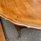 Round extendable dining table Louis XV in solid wood from the 1960s.