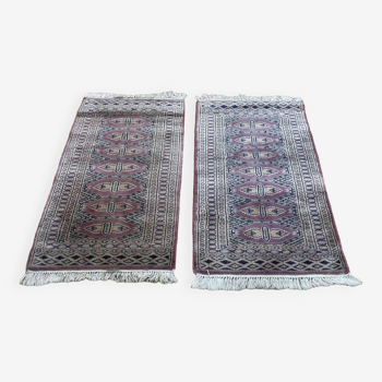 Pair of handmade wool and silk Pakistani rugs