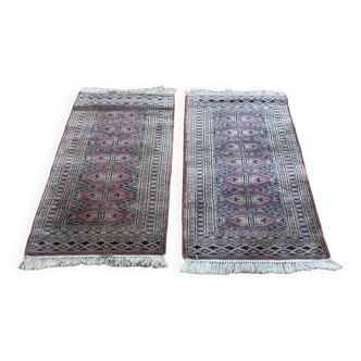 Pair of handmade wool and silk Pakistani rugs