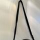 Jacques Adnet pair of circular leather and brass mirrors
