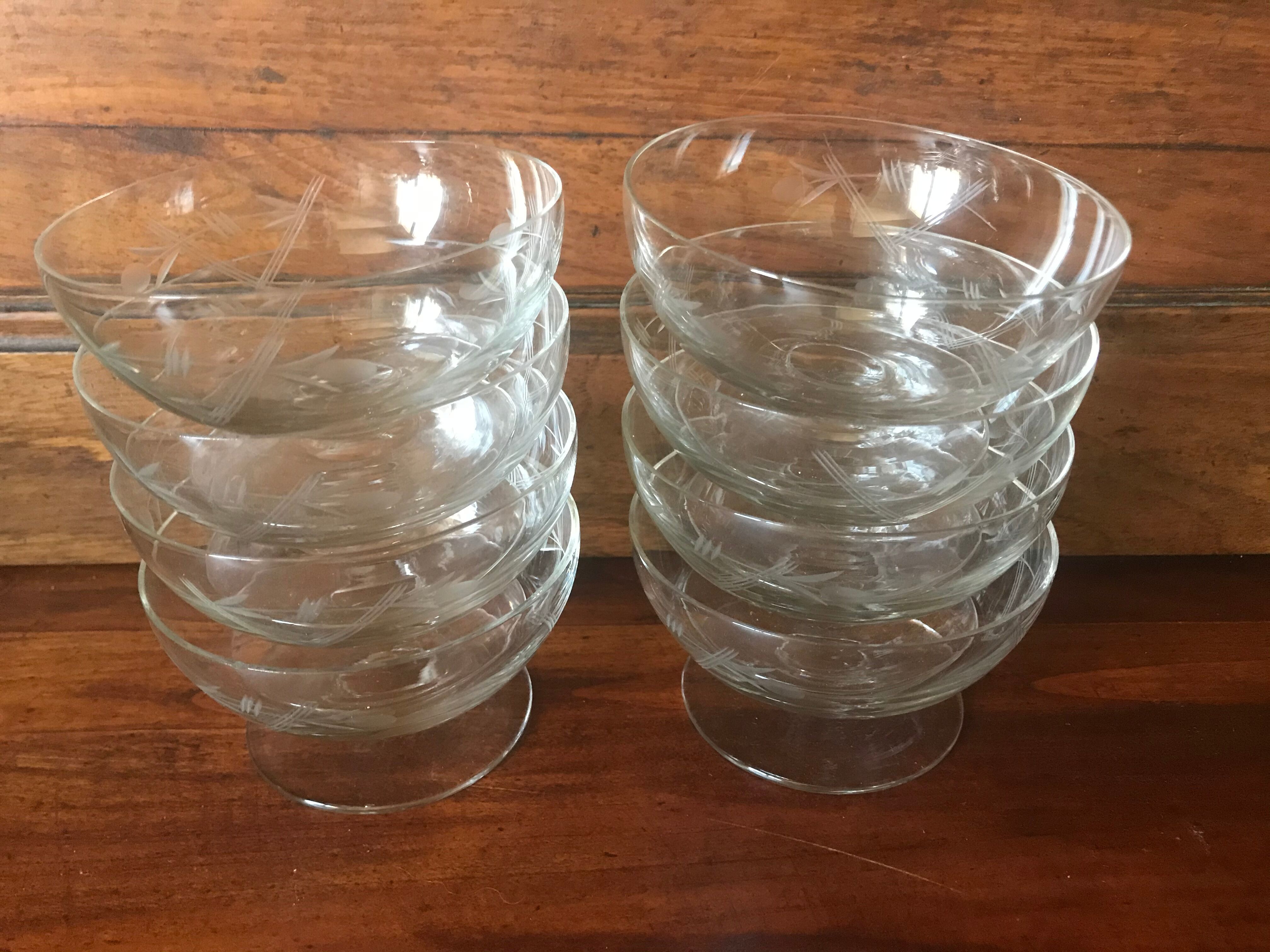 Set of eight engraved crystal champagne glasses