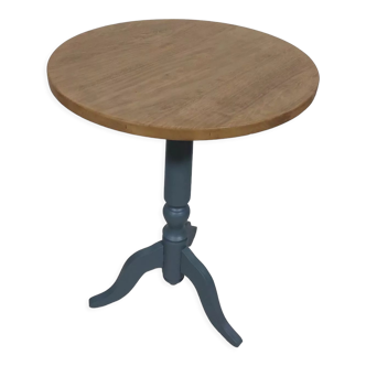 Gray and natural pedestal table