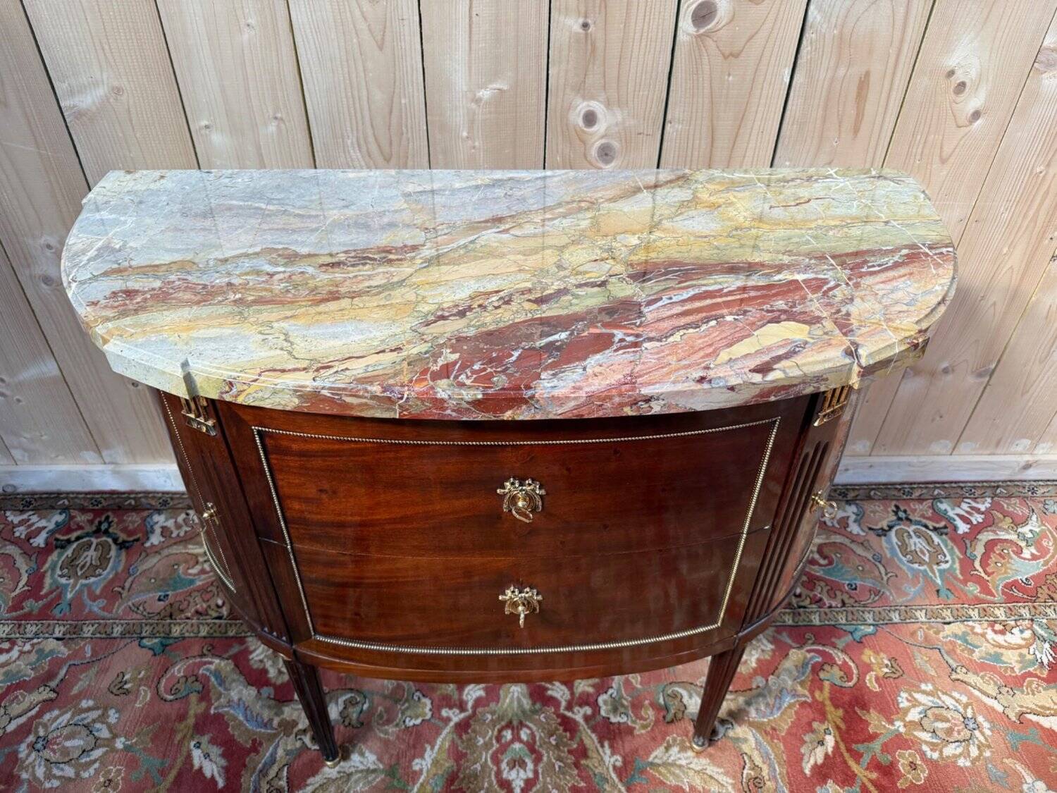 Louis XVI half-moon commode in mahogany and marble