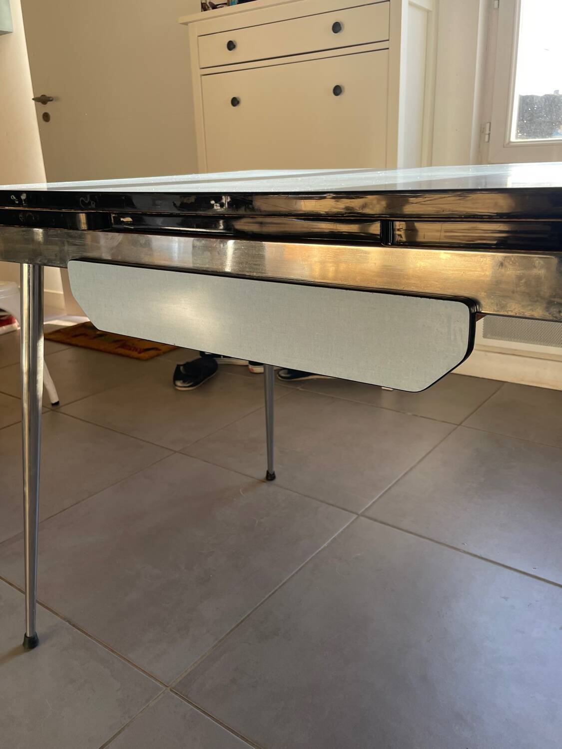 Blue Formica table for 4 to 6 people