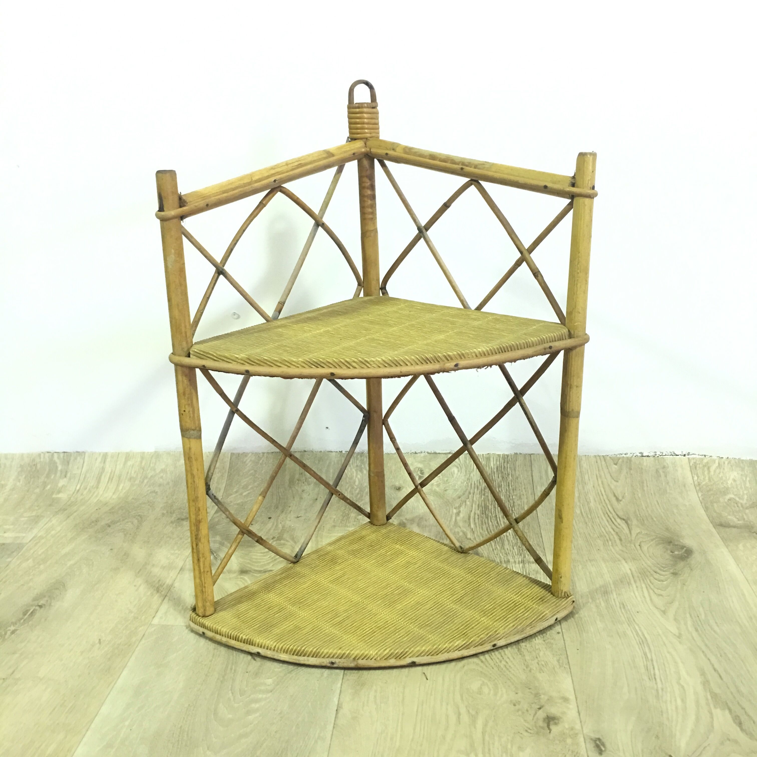 Corner wicker shelf
