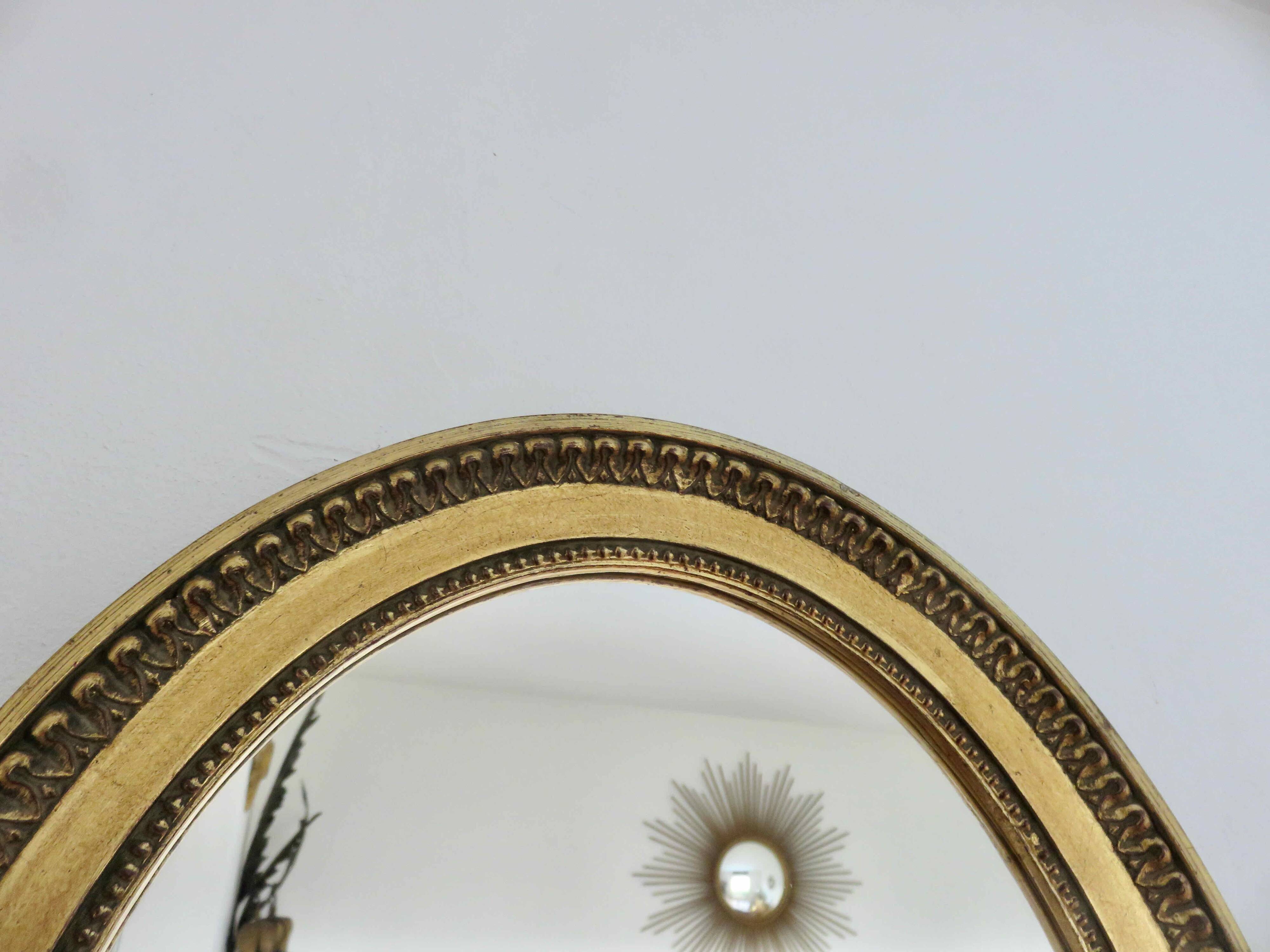 Louis Philippe oval gold wall mirror, 1950s
