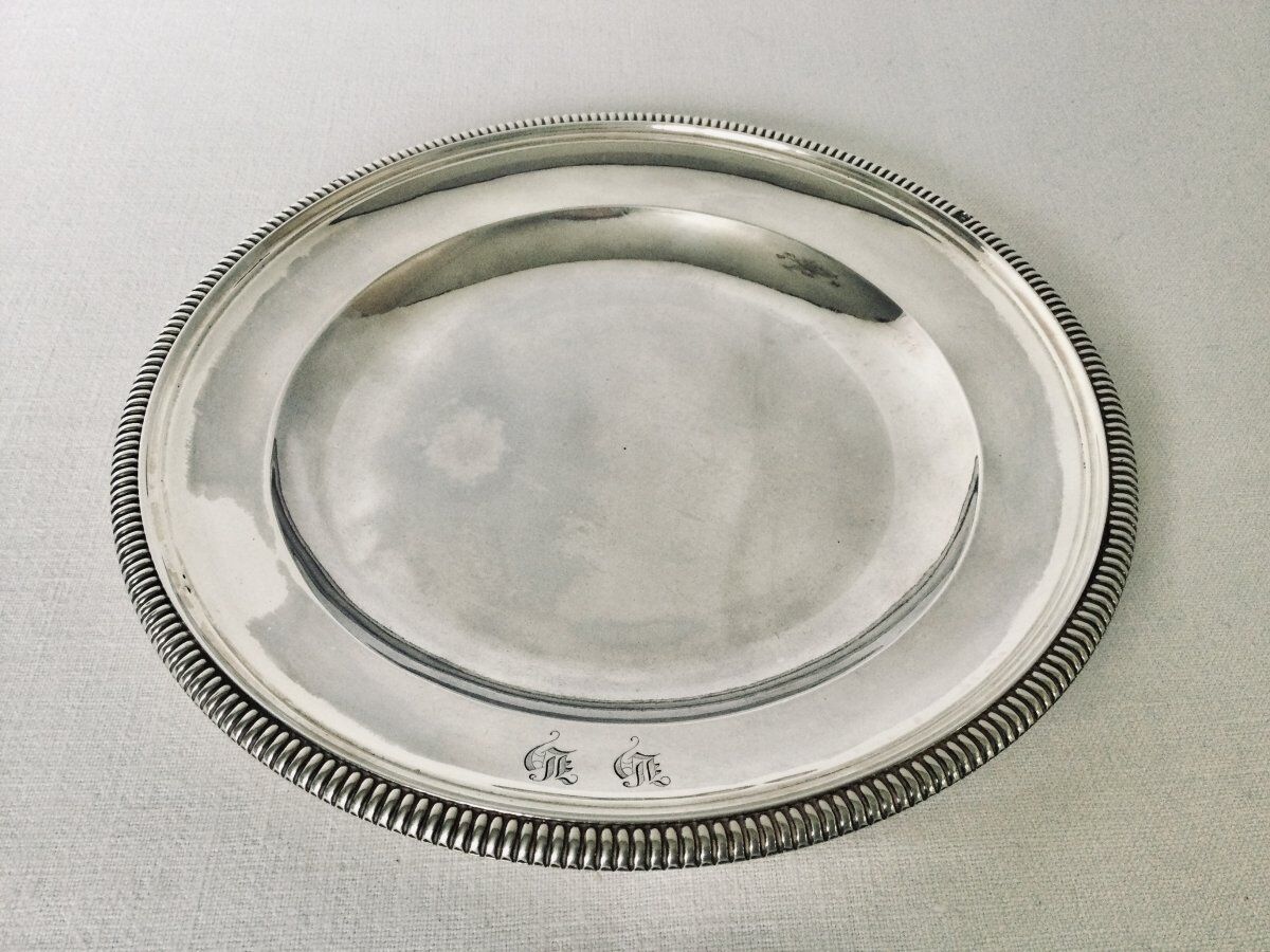 Solid silver dish with old man