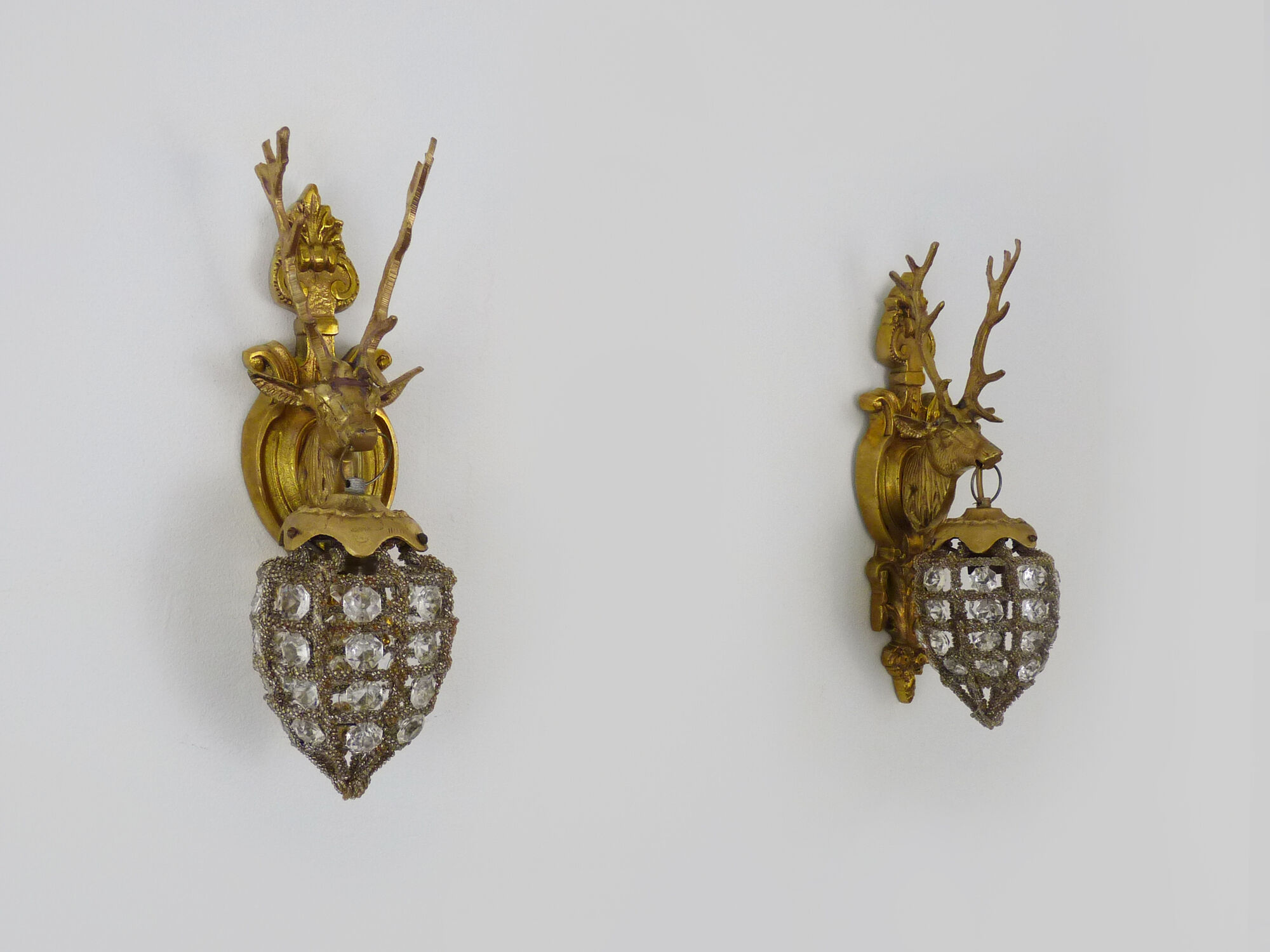 Pair of vintage wall lamps with pearl deer head and glass grapevines