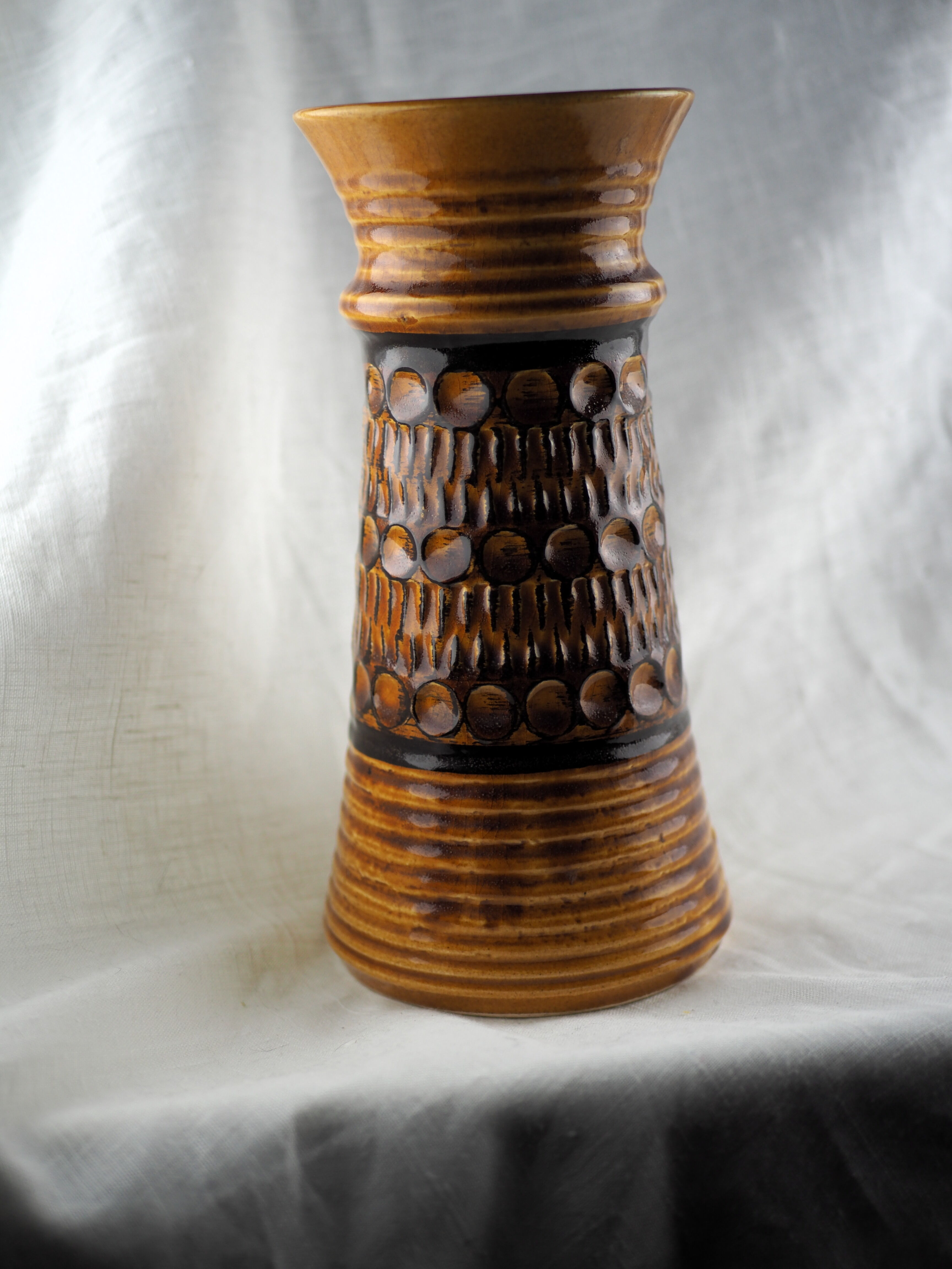 High arched vase, round hollow patterns and spikes, black and ocher seventies vibe - Bay Keramik - 70'
