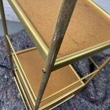 Small rolling trolley in brass and black plastic