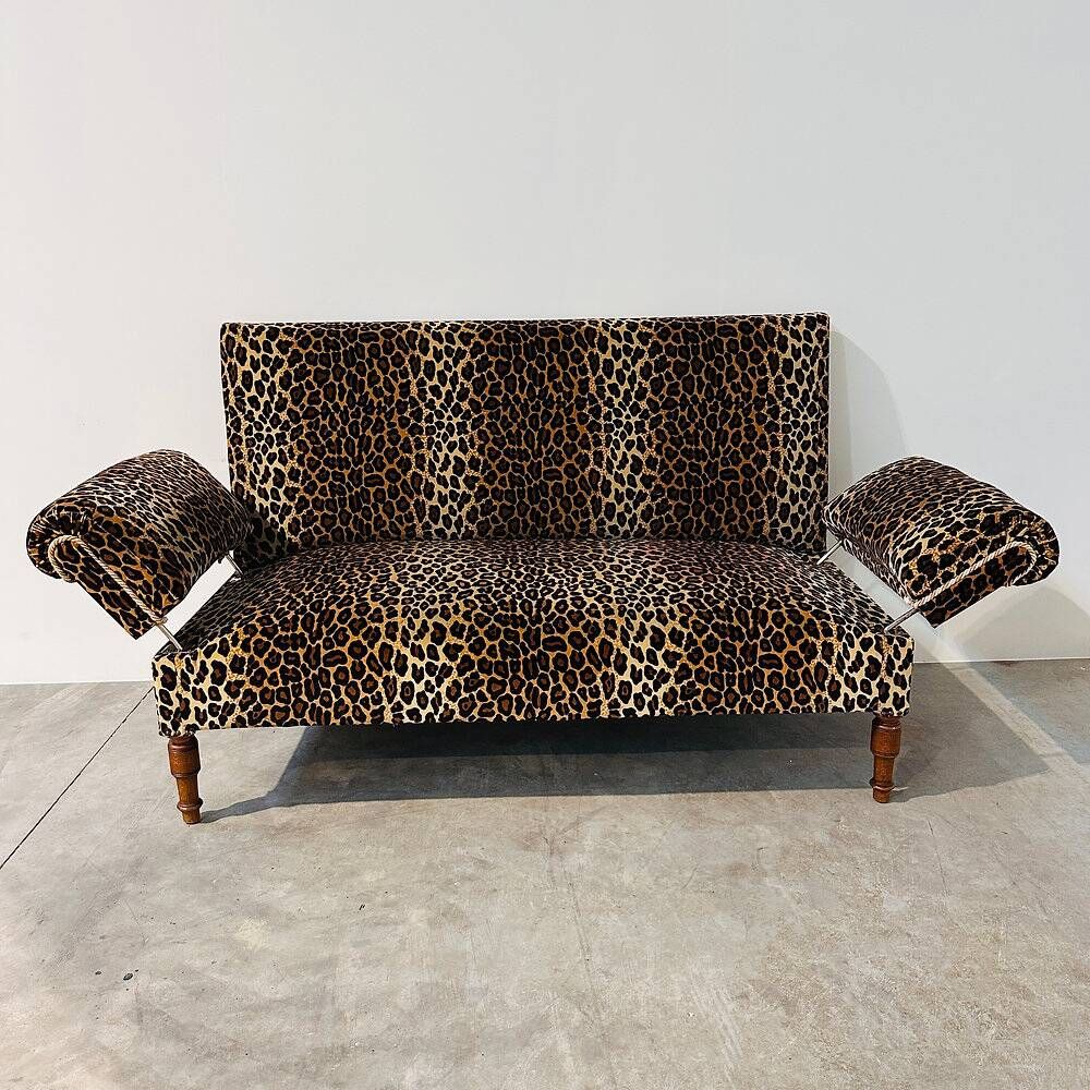 Vintage leopard velvet sofa / wall sofa with drop-down arms, France.