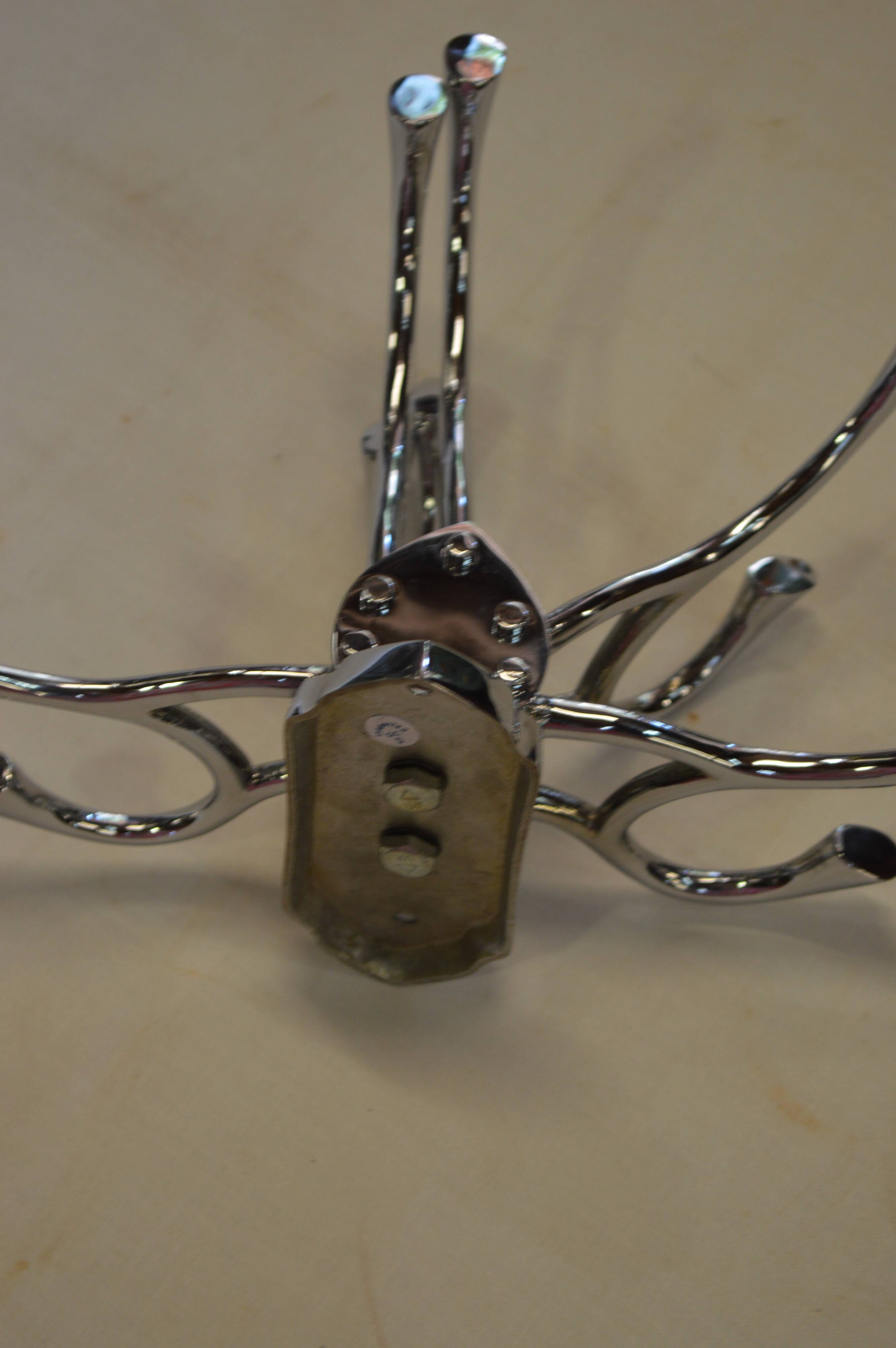 Chrome iron circular coat holder