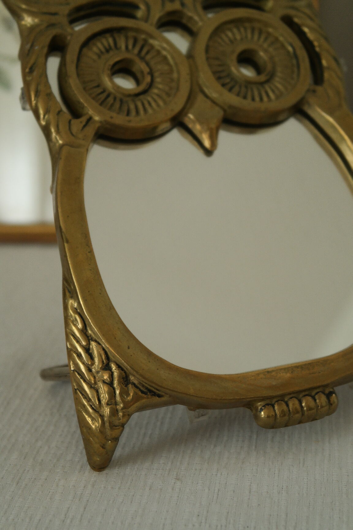 Vintage brass owl table mirror