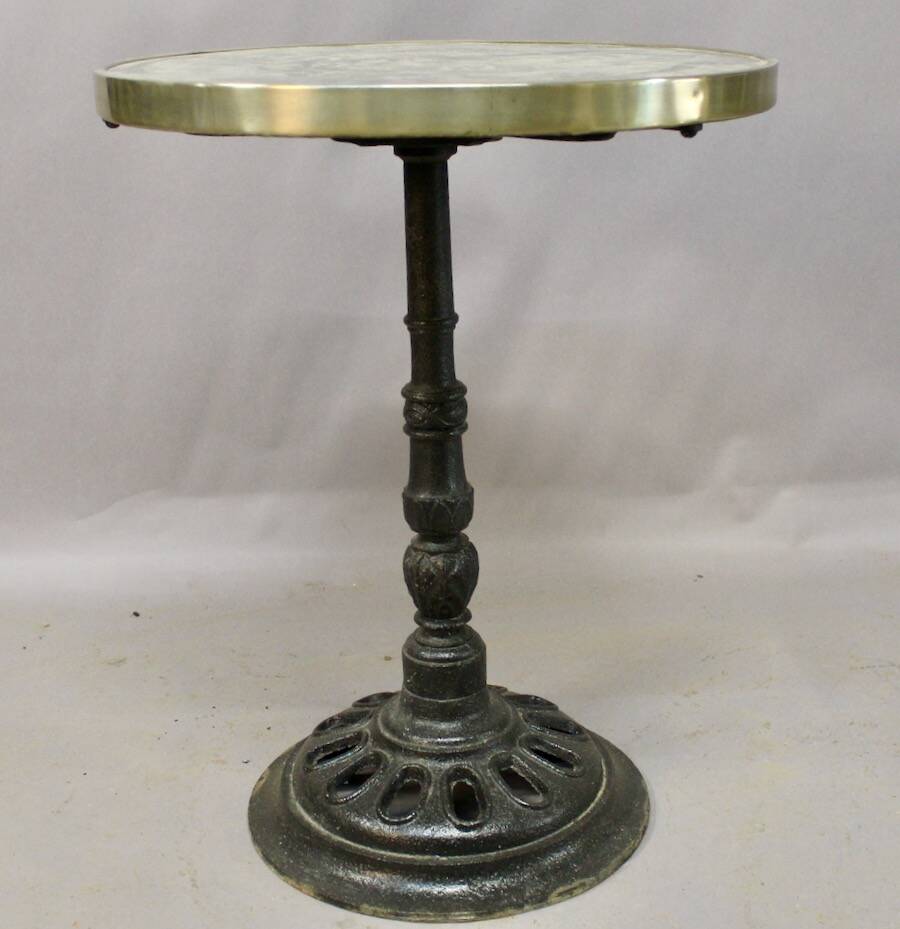 Bistro table with marble top and brass rim