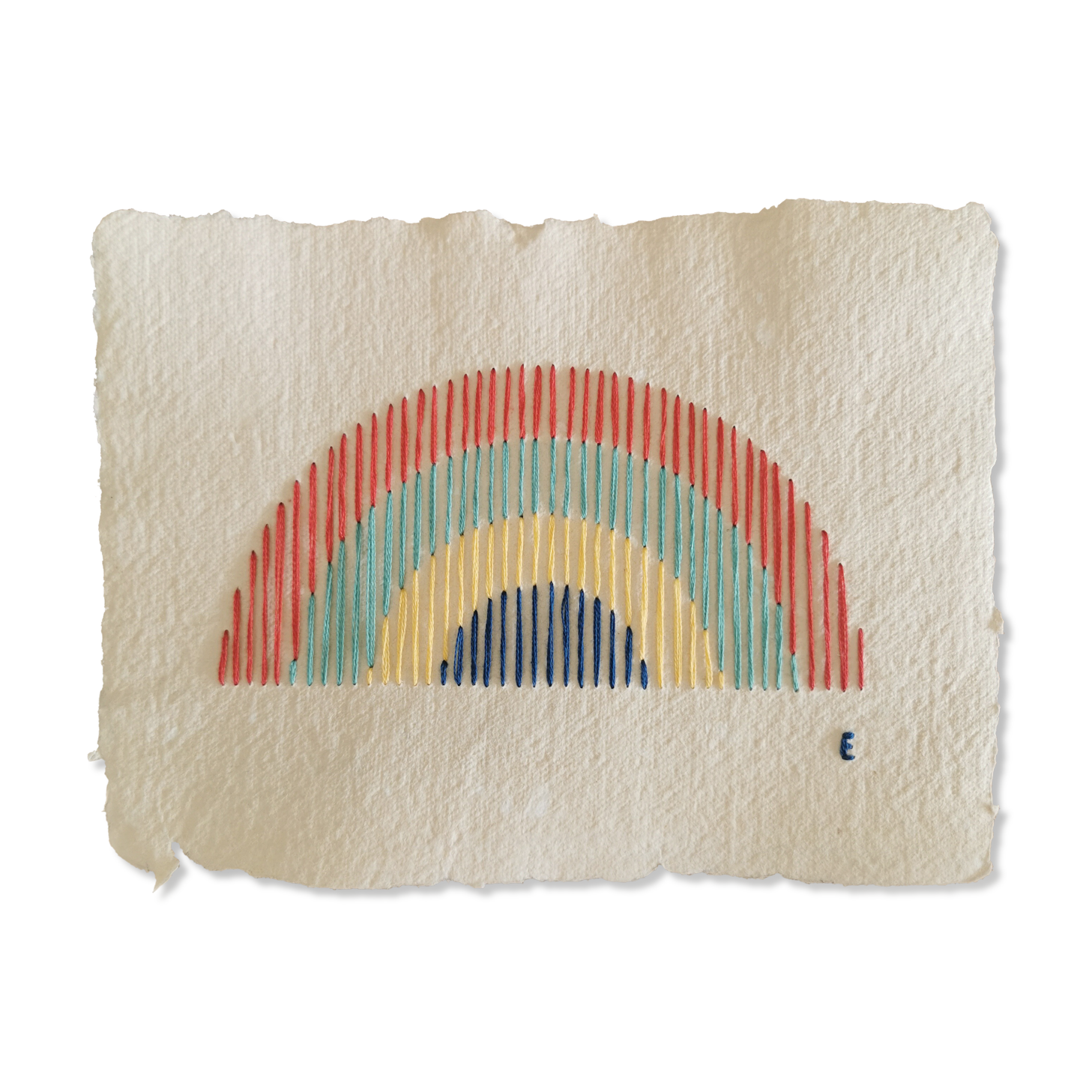 Rainbow embroidery on recycled paper