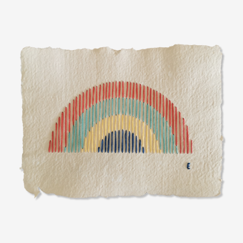 Rainbow embroidery on recycled paper
