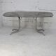 Chrome steel table with smoked glass top, France, circa 1970.