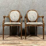 Pair of Louis XVI armchairs with medallion backs circa 1940