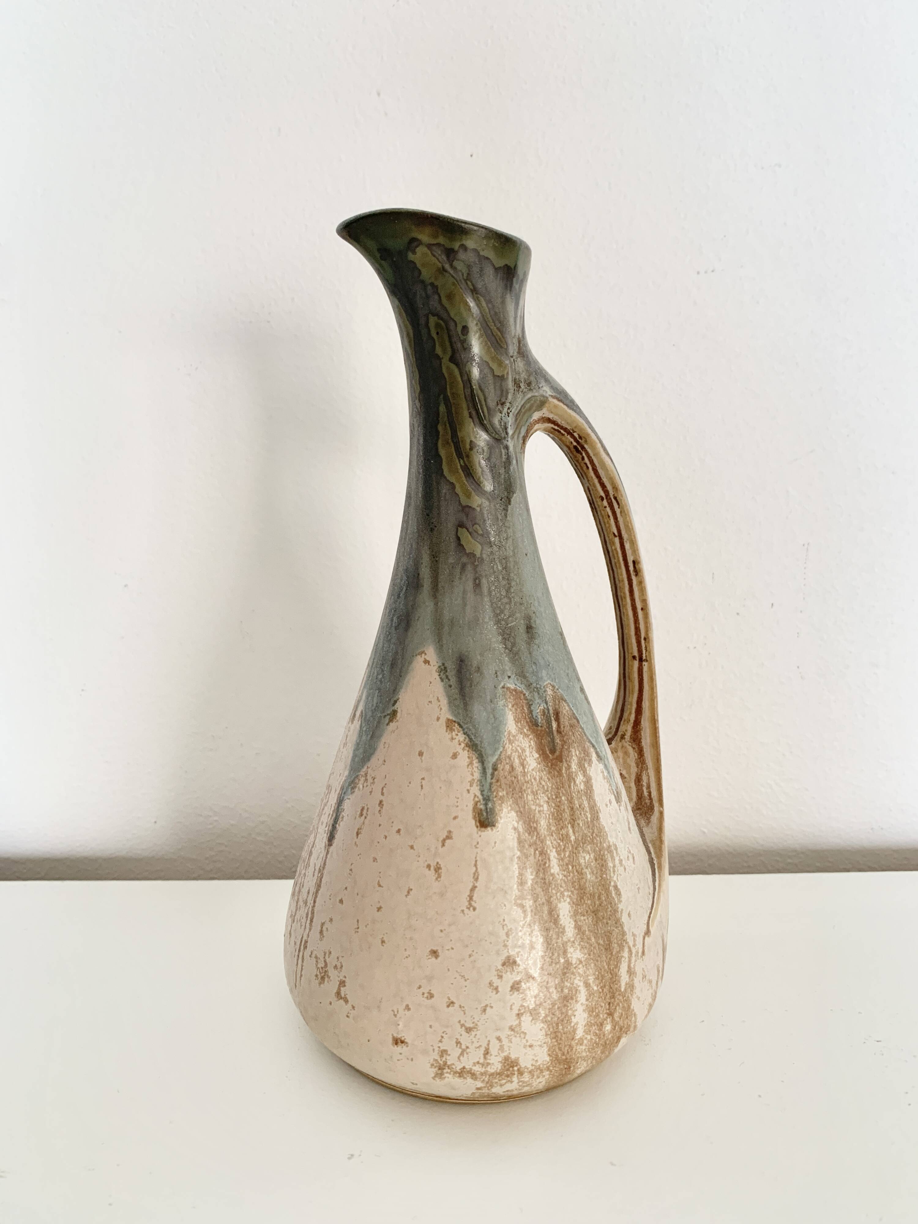 Stoneware jug signed Denbac