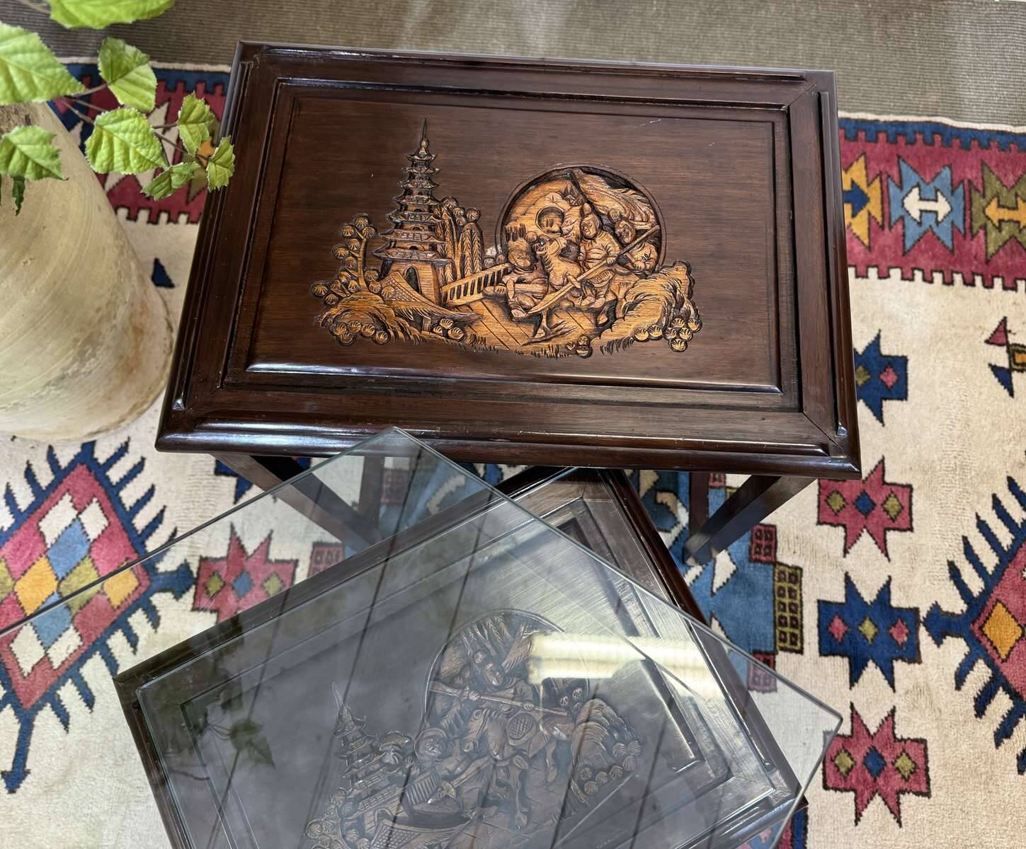 Set of 4 Chinese nesting tables in teak from the 1980s.