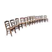 12 old and mismatched chairs