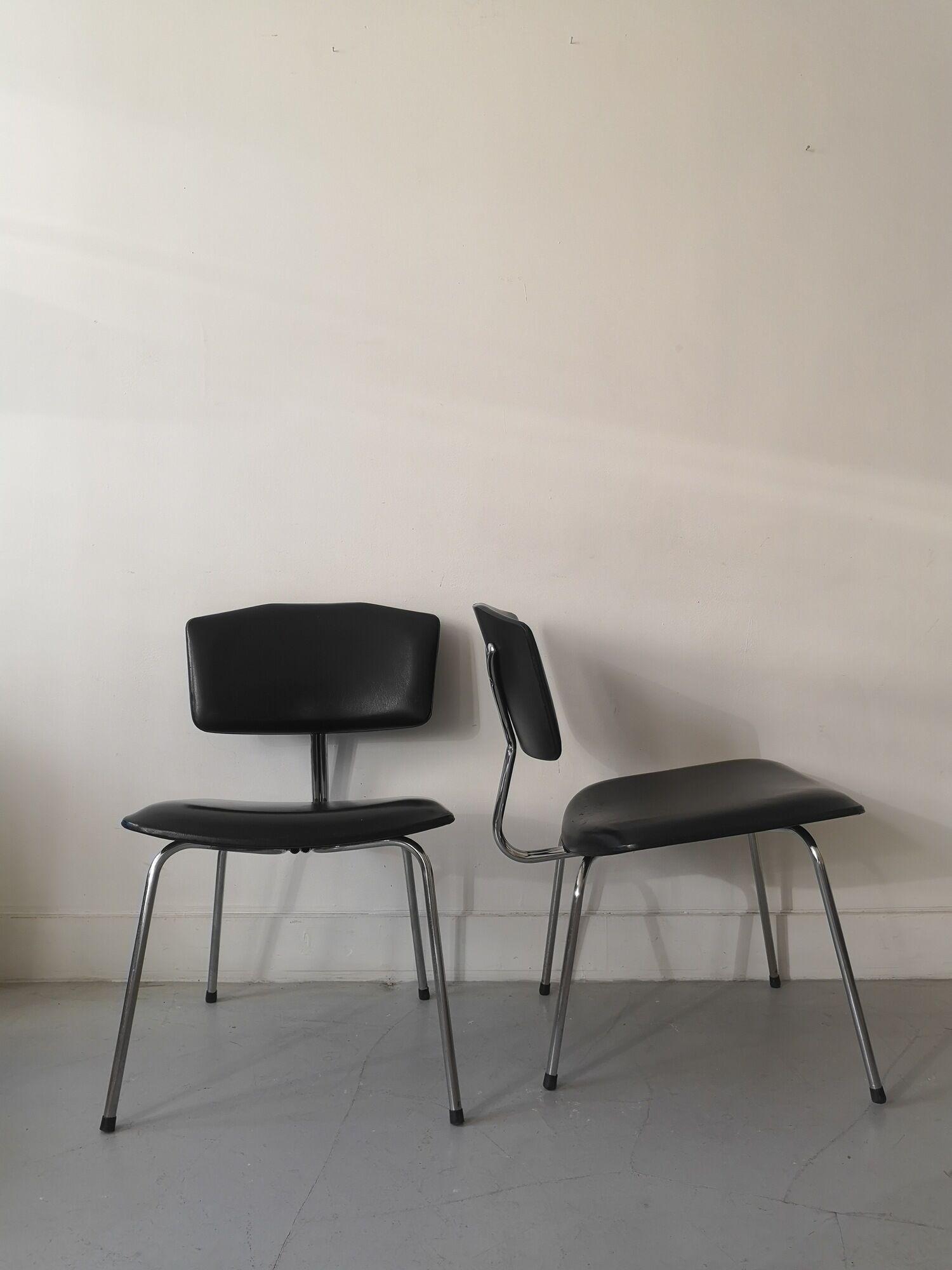 Pair of heaters design in black skai leather and metal, 1970