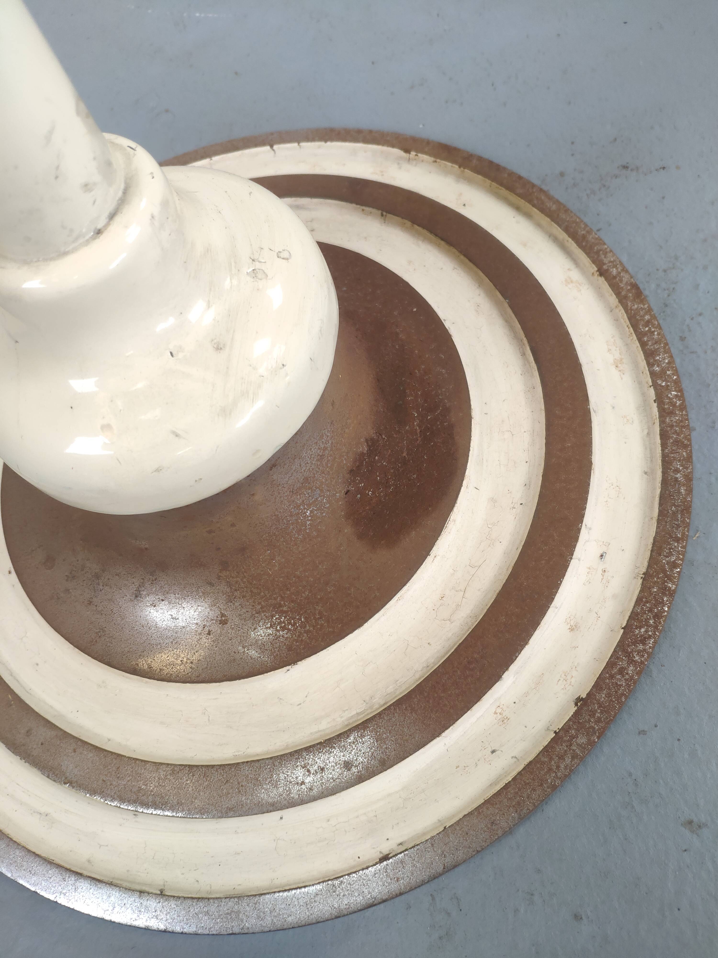 Old swivel orange sitting dentist stool