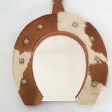 Vintage 1970s cowhide horseshoe mirror