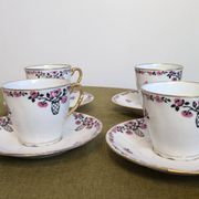 Service à café en porcelaine 18 pièces signé "Aux Lions de Faïence Paris"