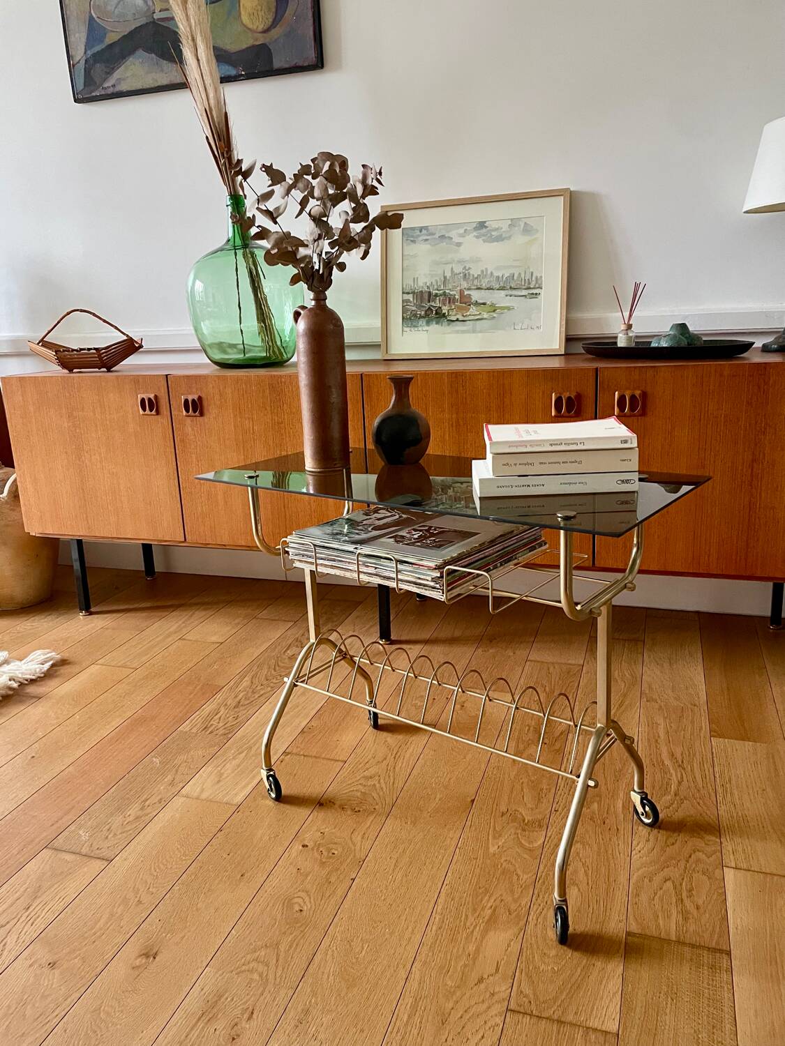 Green and brass trolley on wheels